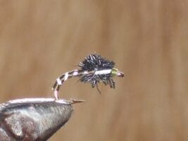 Buzzer olive trout fly